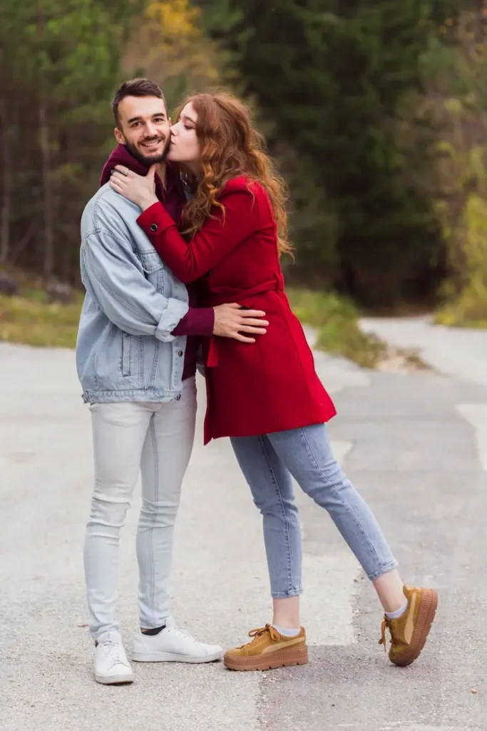 girlfriend kissing handsome boyfriend full shot 23 2148375506 1 1